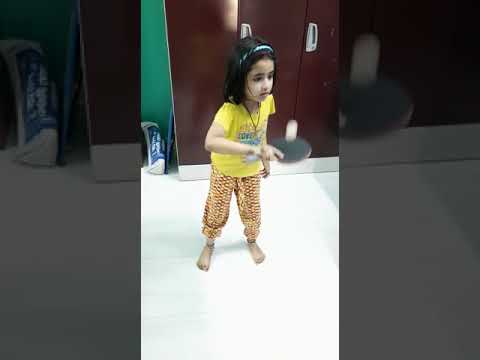 My Daughter Bouncing a Table Tennis Ball